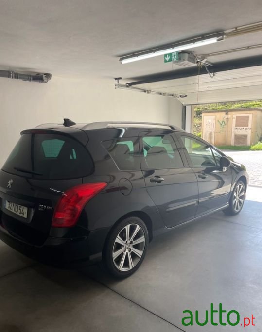 2012' Peugeot 308 Sw photo #1