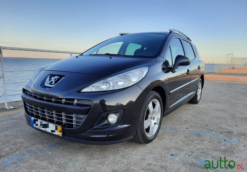 2012' Peugeot 207 Sw photo #1