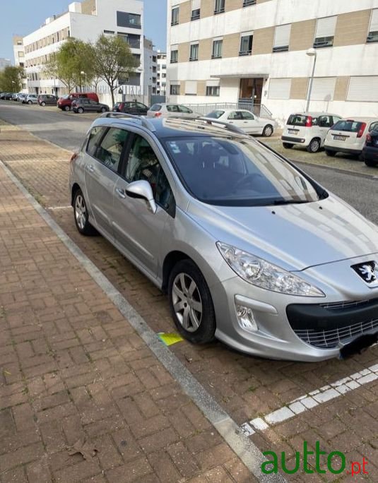 2009' Peugeot 308 Sw photo #1