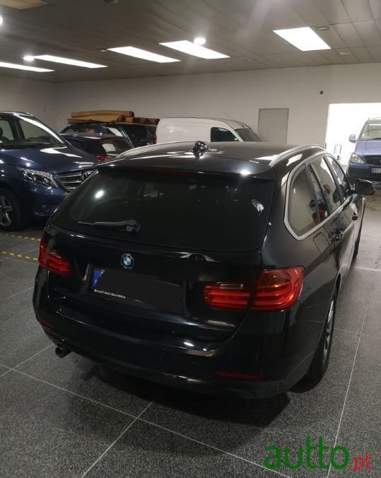 2014' BMW 318 photo #2