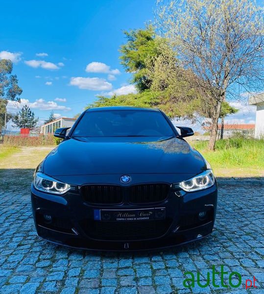 2015' BMW 318 photo #2