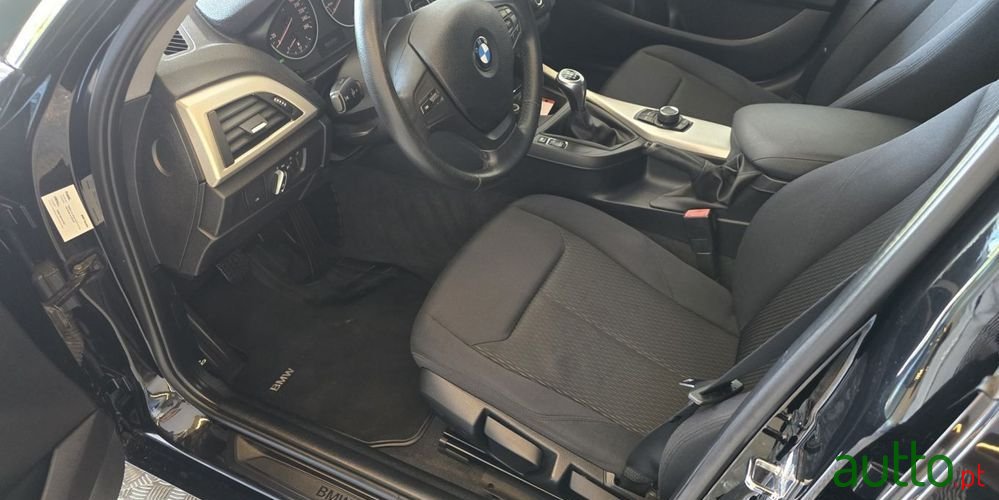 2011' BMW 116 I photo #6