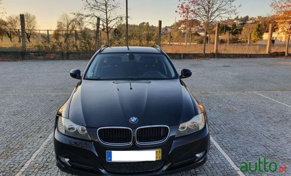 2009' BMW 318 D photo #1