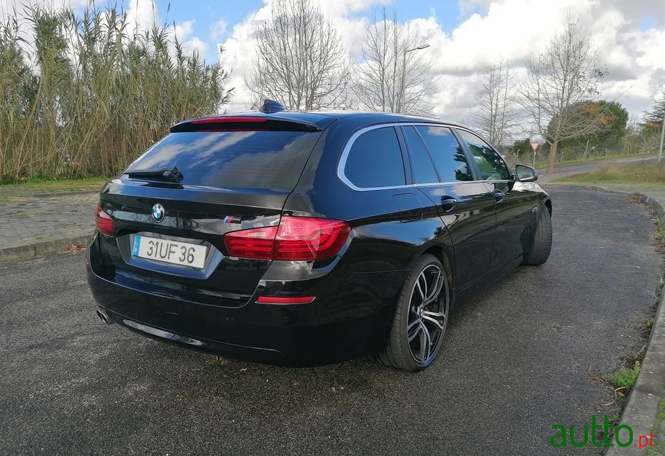 2014' BMW 520 photo #6