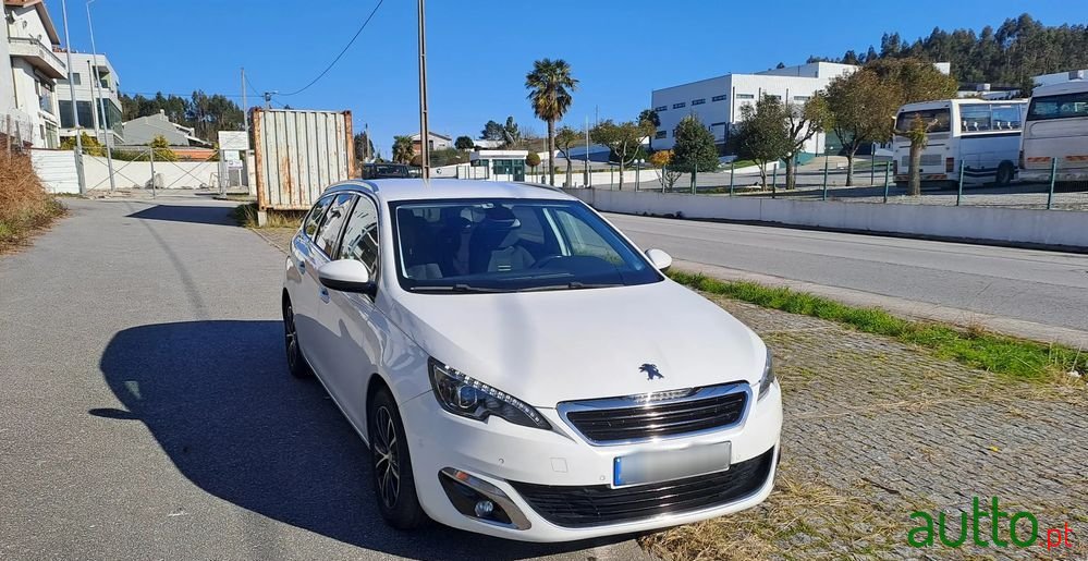 2014' Peugeot 308 Sw photo #1
