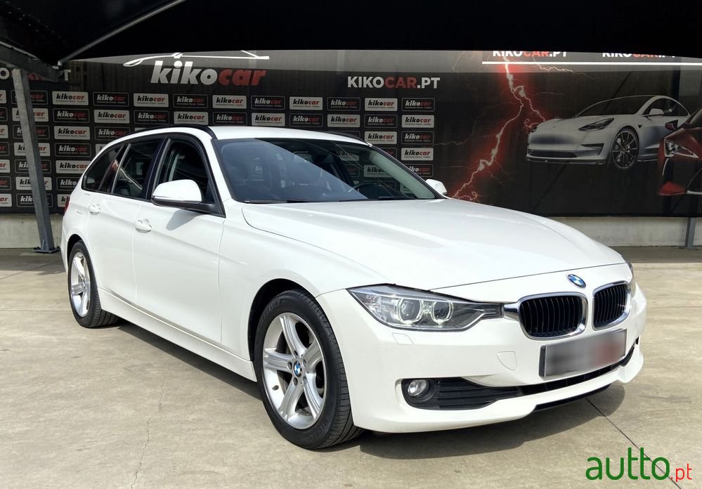 2013' BMW 318 D Touring photo #1