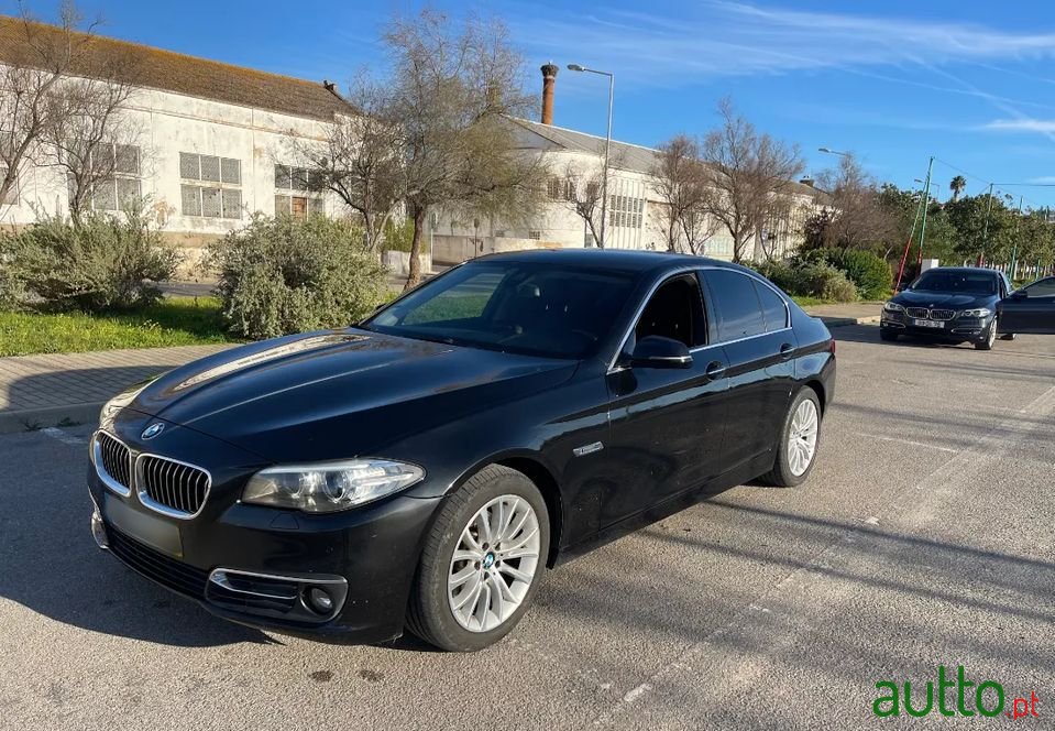 2014' BMW 520 photo #1