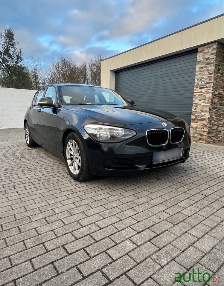 2012' BMW 118 D photo #1