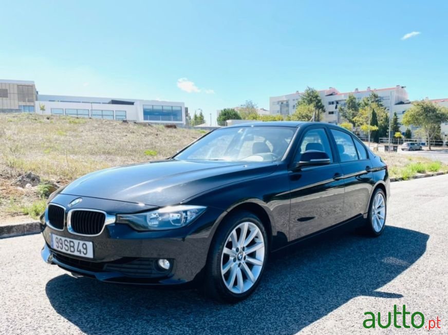 2012' BMW 316 photo #1