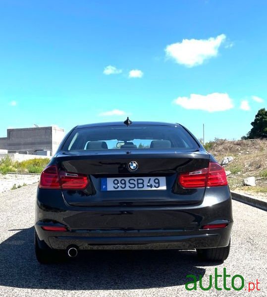 2012' BMW 316 photo #6
