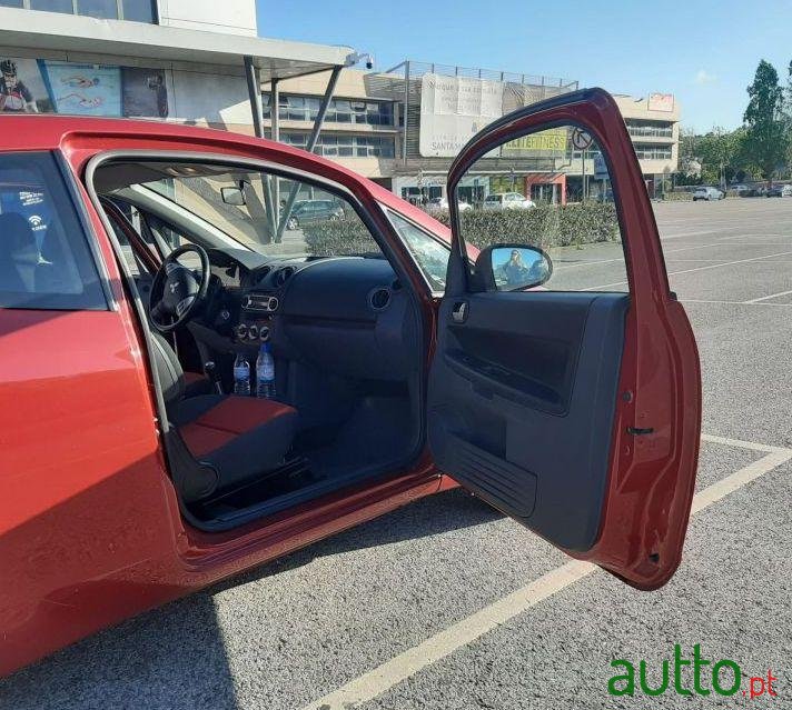 2009' Mitsubishi Colt photo #2