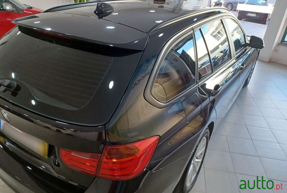 2013' BMW 318 D Touring Line Sport photo #6