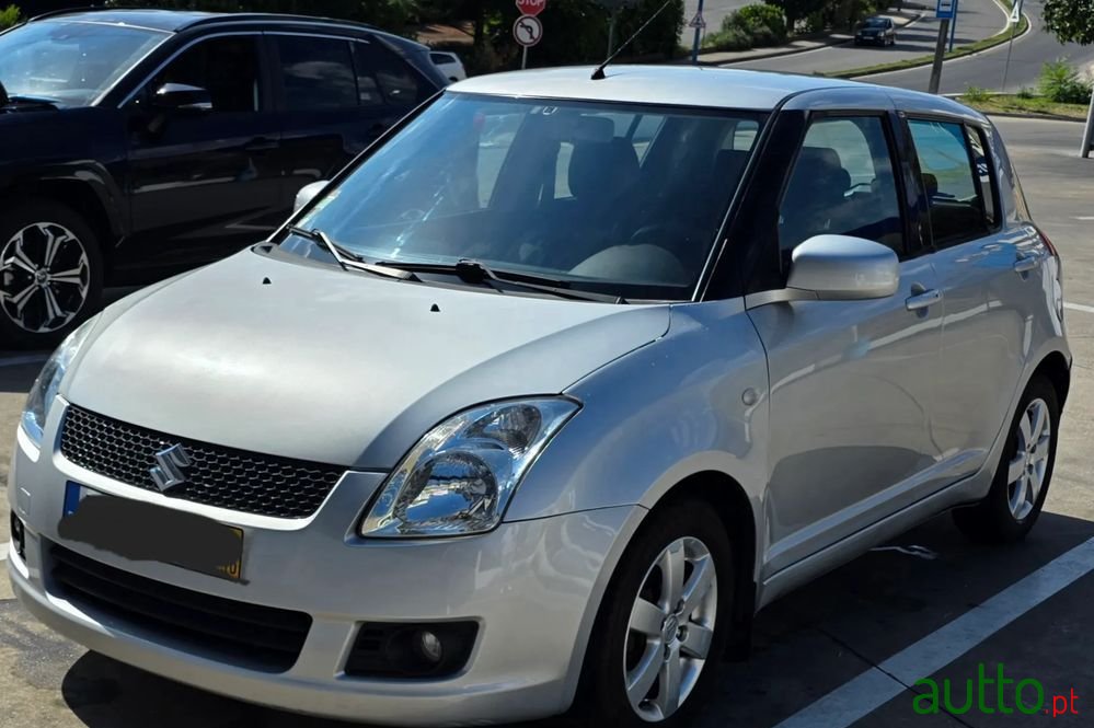2009' Suzuki Swift 1.3 Ddis Glx photo #1