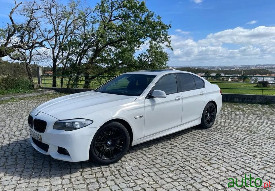 2013' BMW 520 photo #1