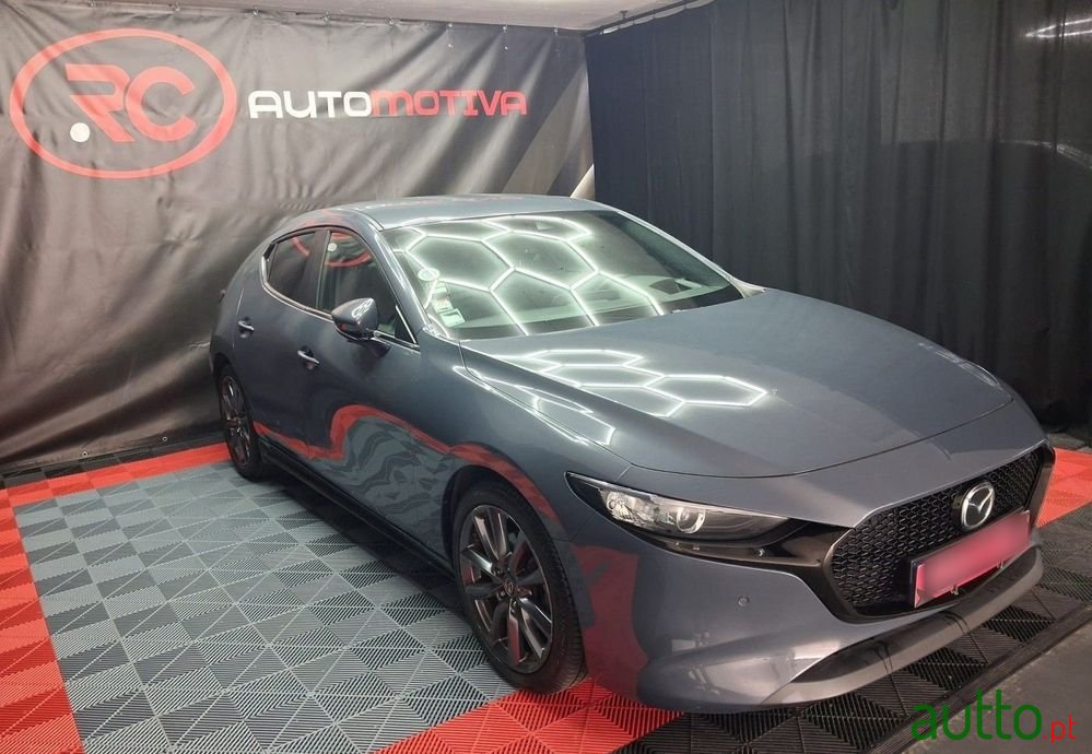 2019' Mazda 3 Hatchback photo #1