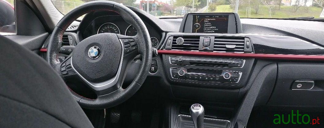 2013' BMW 318 D Line Sport photo #2