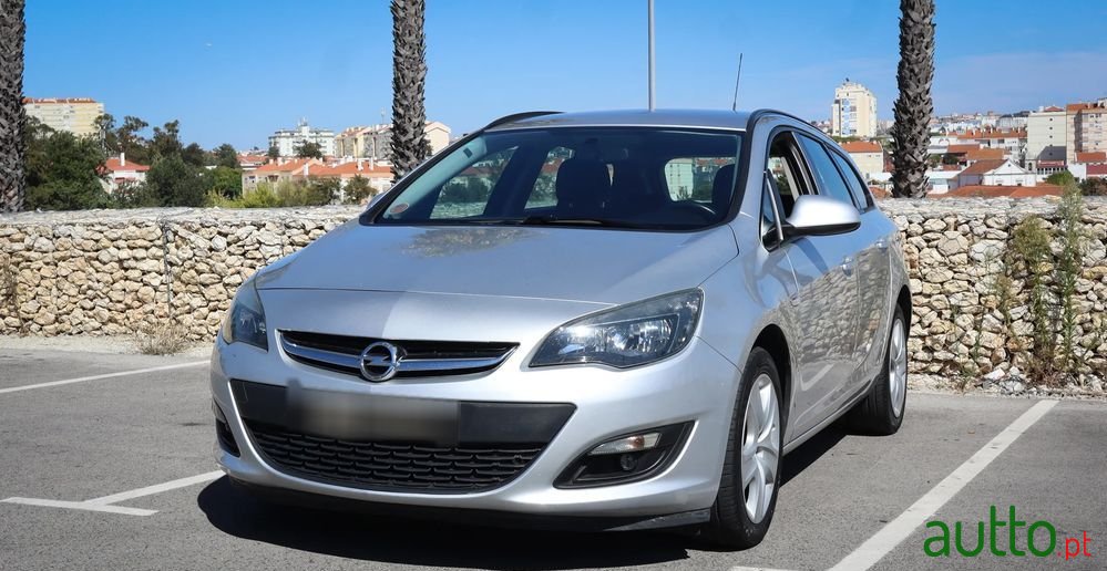 2014' Opel Astra Sports Tourer photo #1