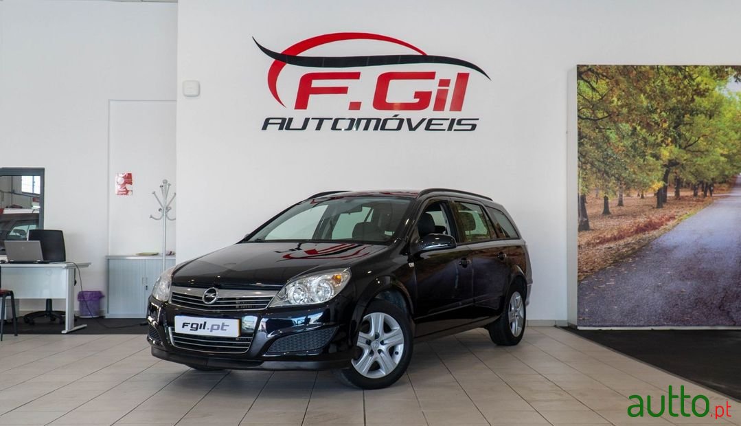 2009' Opel Astra Caravan photo #1