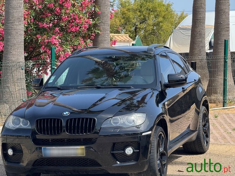 2009' BMW Série X Xdrive35D photo #1