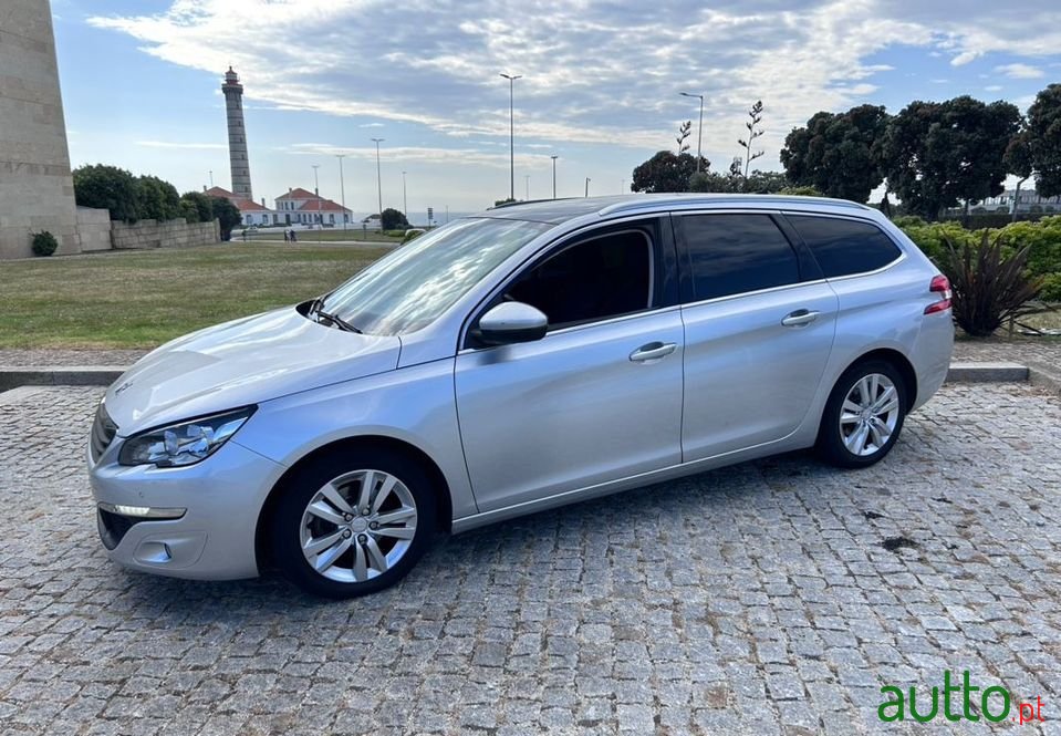 2014' Peugeot 308 Sw photo #1