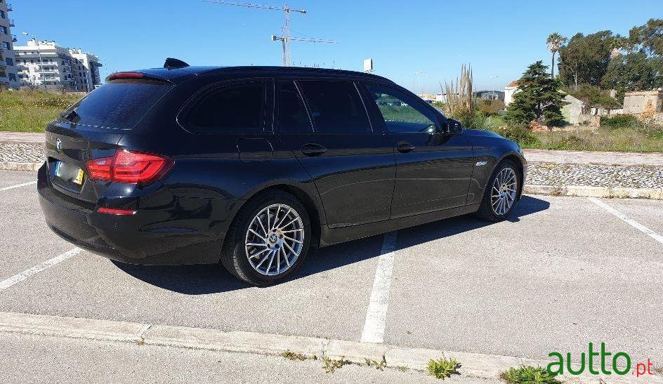 2011' BMW 520 photo #1