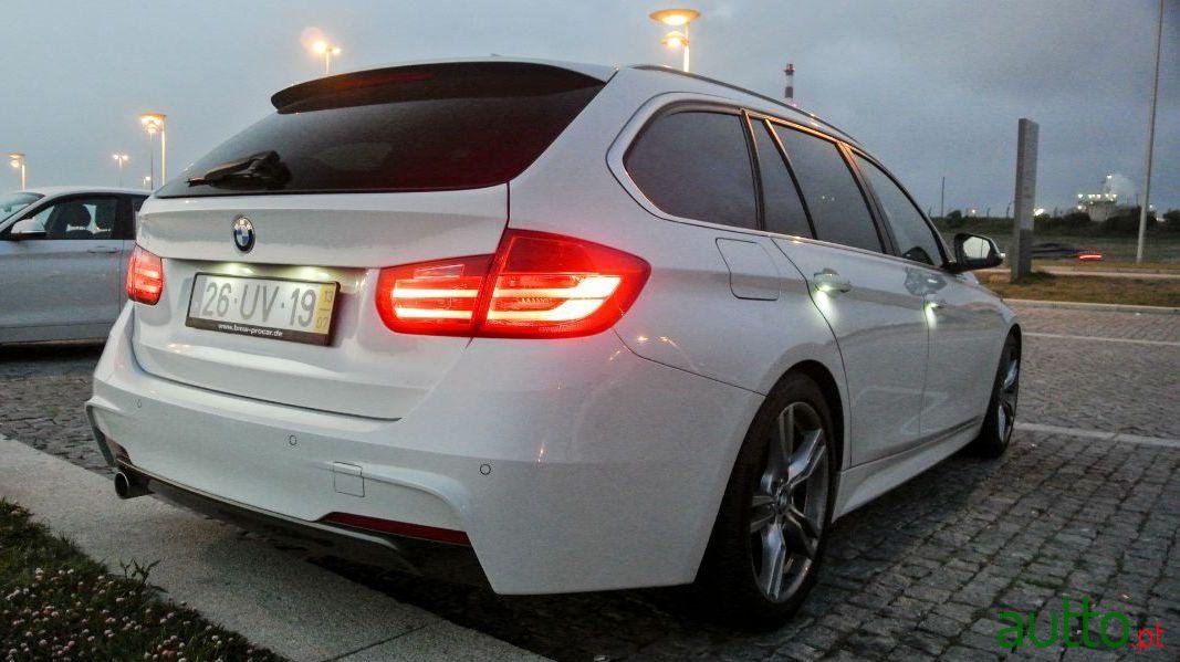 2013' BMW 318 photo #1