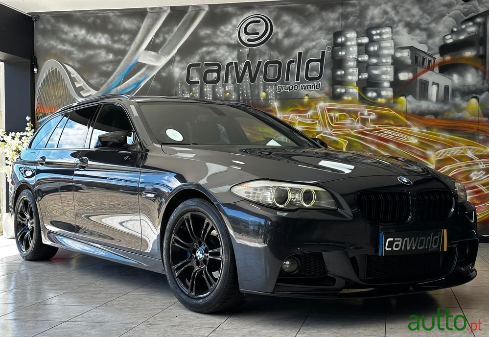 2011' BMW 520 D Pack M Auto photo #1