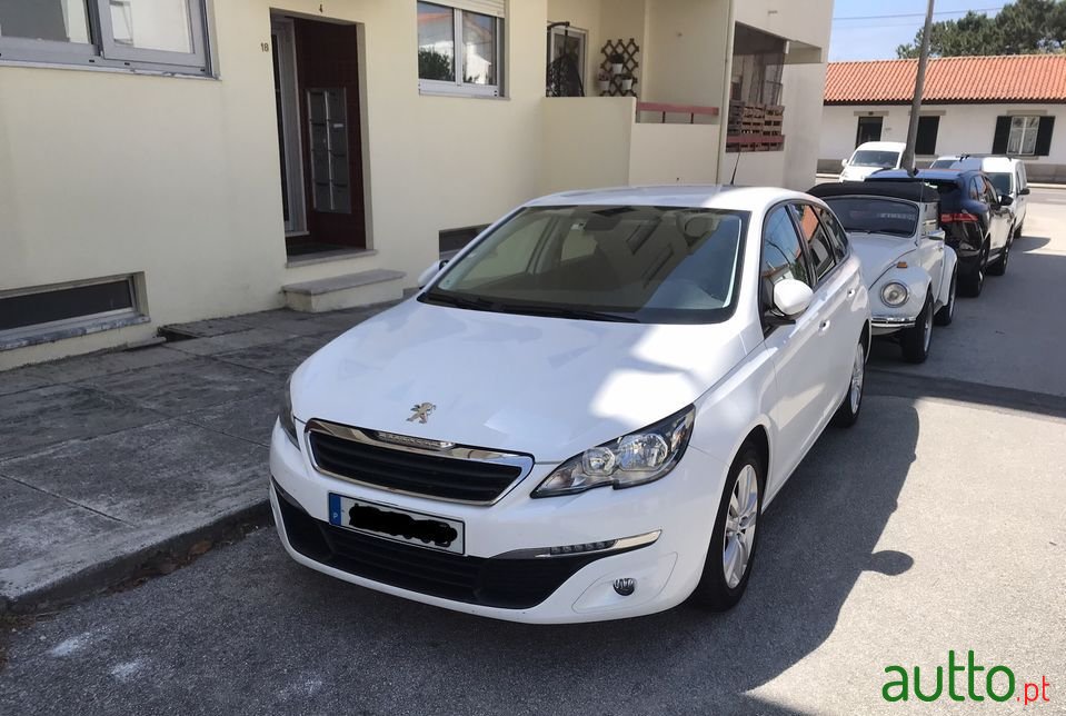 2015' Peugeot 308 Sw photo #1