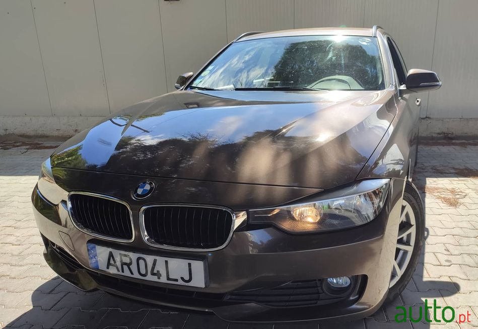 2014' BMW 318 photo #1