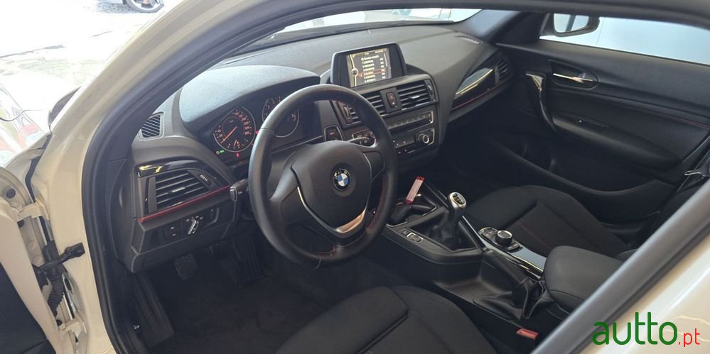 2011' BMW 116 I Line Sport photo #6