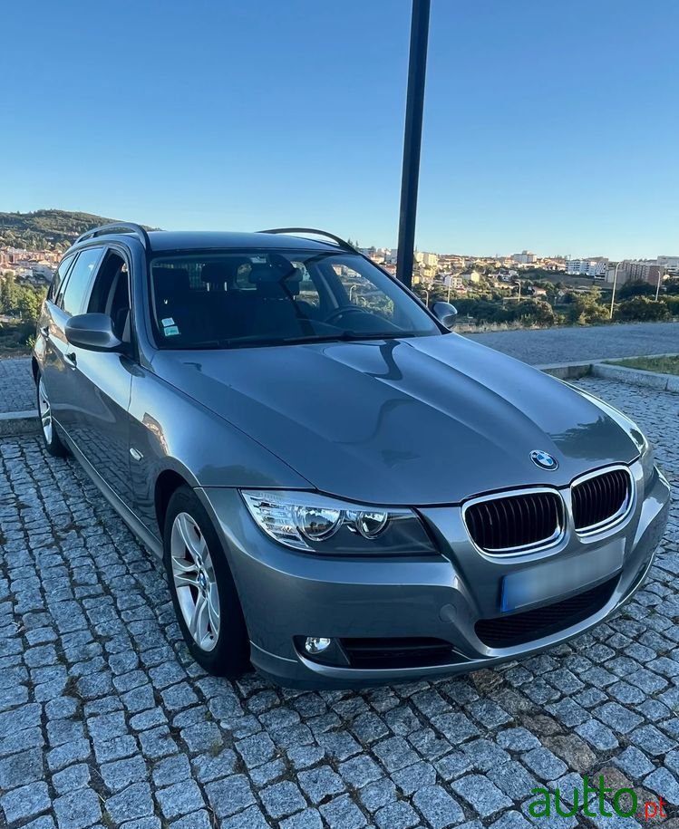 2009' BMW 318 photo #1