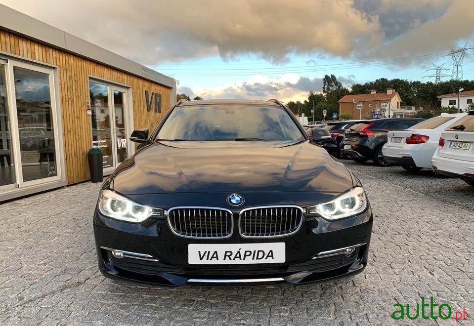 2015' BMW 318 photo #2