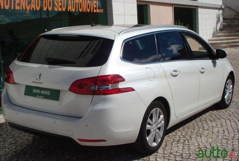 2014' Peugeot 308 Sw photo #1