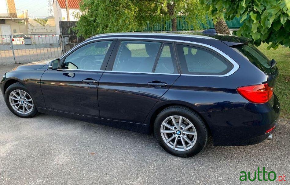 2015' BMW 318 photo #1