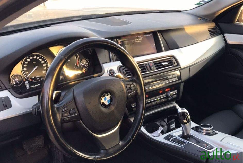 2014' BMW 520 Luxury photo #1