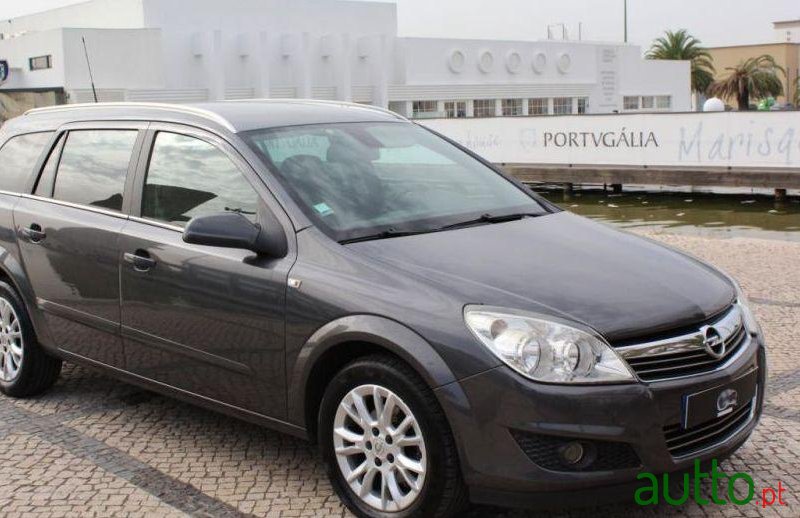 2009' Opel Astra Caravan photo #1