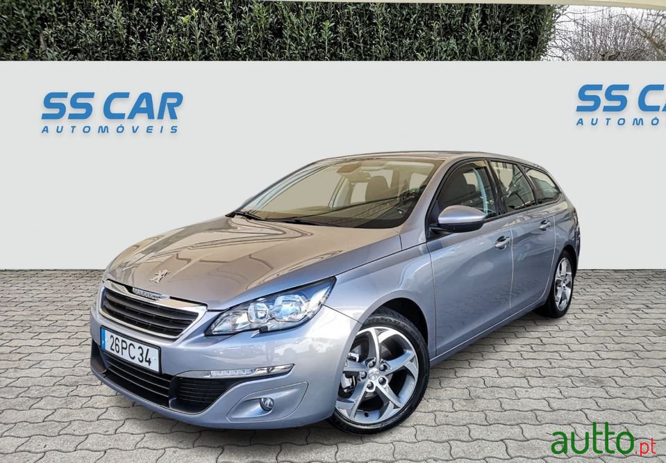2014' Peugeot 308 Sw photo #1