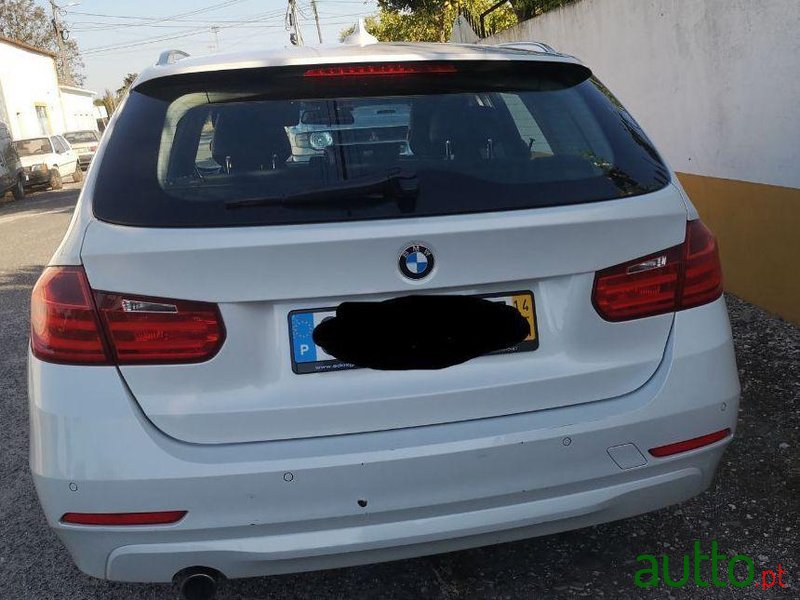 2014' BMW 318 D Touring photo #3