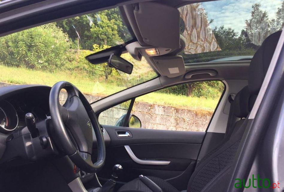 2009' Peugeot 308 Sw photo #1