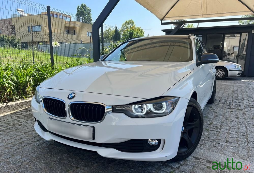 2014' BMW 318 D photo #1