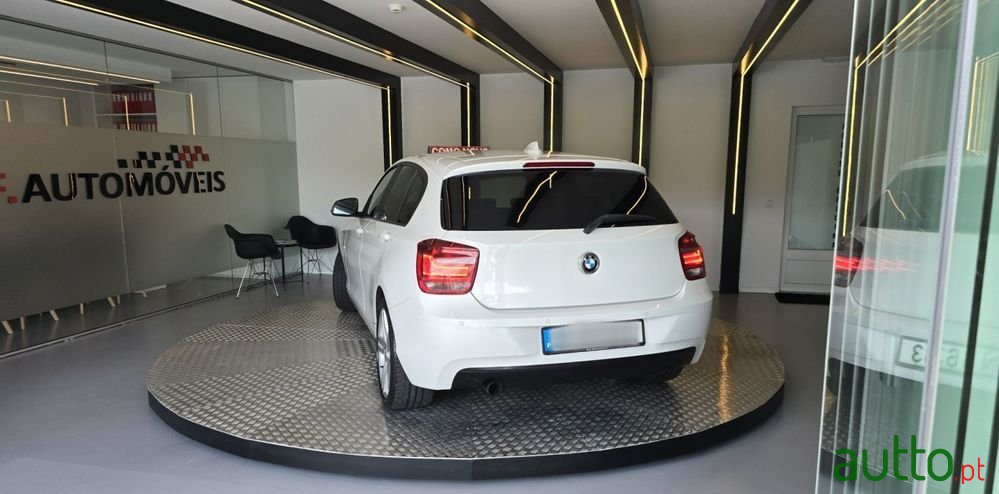 2011' BMW 116 I Line Sport photo #3