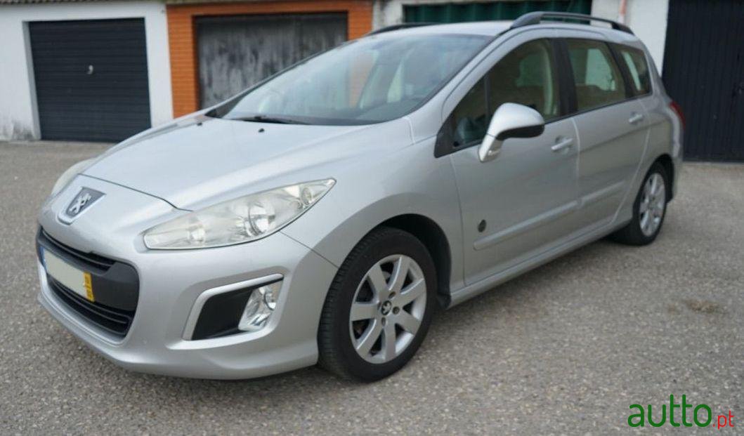 2013' Peugeot 308 Sw photo #1