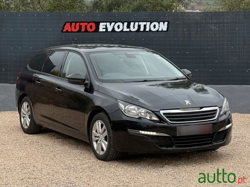 2014' Peugeot 308 Sw photo #1