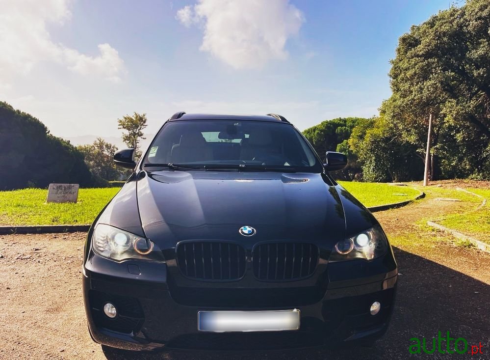 2009' BMW Série X Xdrive35D photo #3