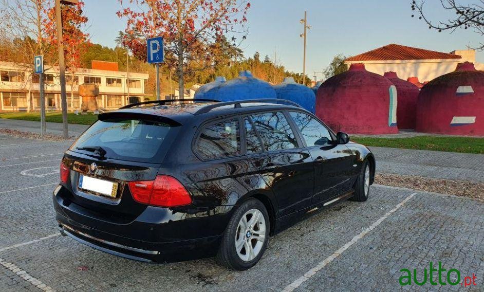 2009' BMW 318 D photo #5