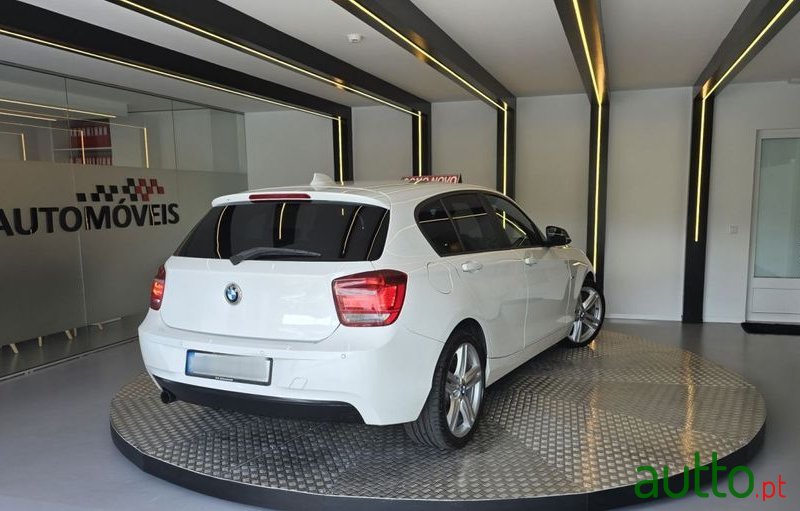 2011' BMW 116 I Line Sport photo #4