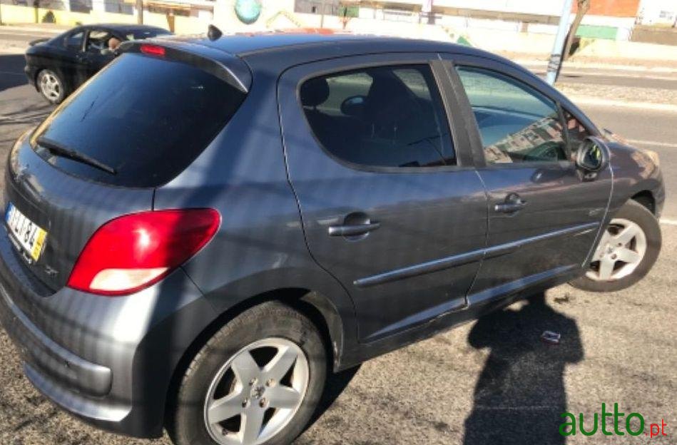 2011' Peugeot 207 Sportium 1.4 Hdi photo #4