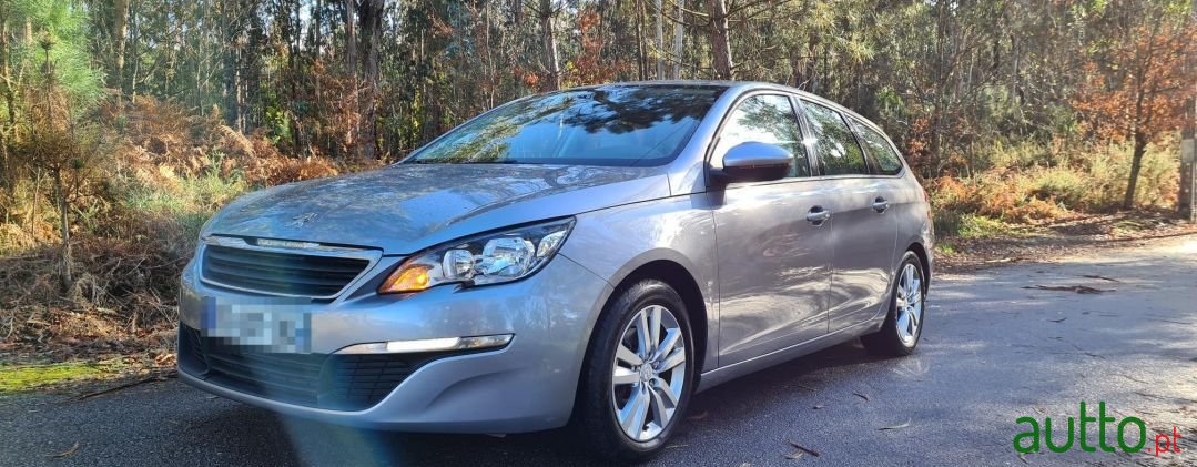 2014' Peugeot 308 Sw photo #1