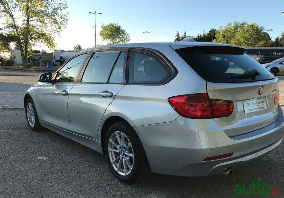 2014' BMW 318 D Touring photo #2